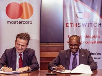 Mastercard's Dimitrios Dosis and EthSwitch's Yilebes Addis during the signing ceremony (PHOTO: Mastercard)